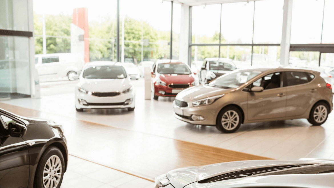 dealership with illuminated cars